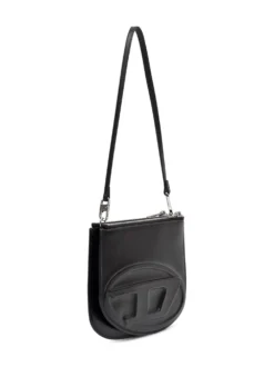 Compact crossbody bag with sculpted design